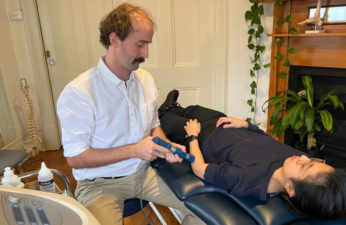 Andrew Macdonald treating a patient at Physio Melbourne