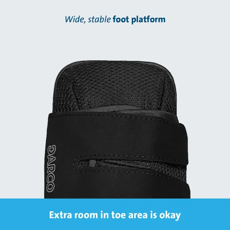 The boot from above, showing the wide, stable foot platform and the room left at the toe
