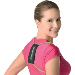A woman in a pink top seen from behind, the green Posture Medic band looped around both shoulders with its black panel between the shoulder blades