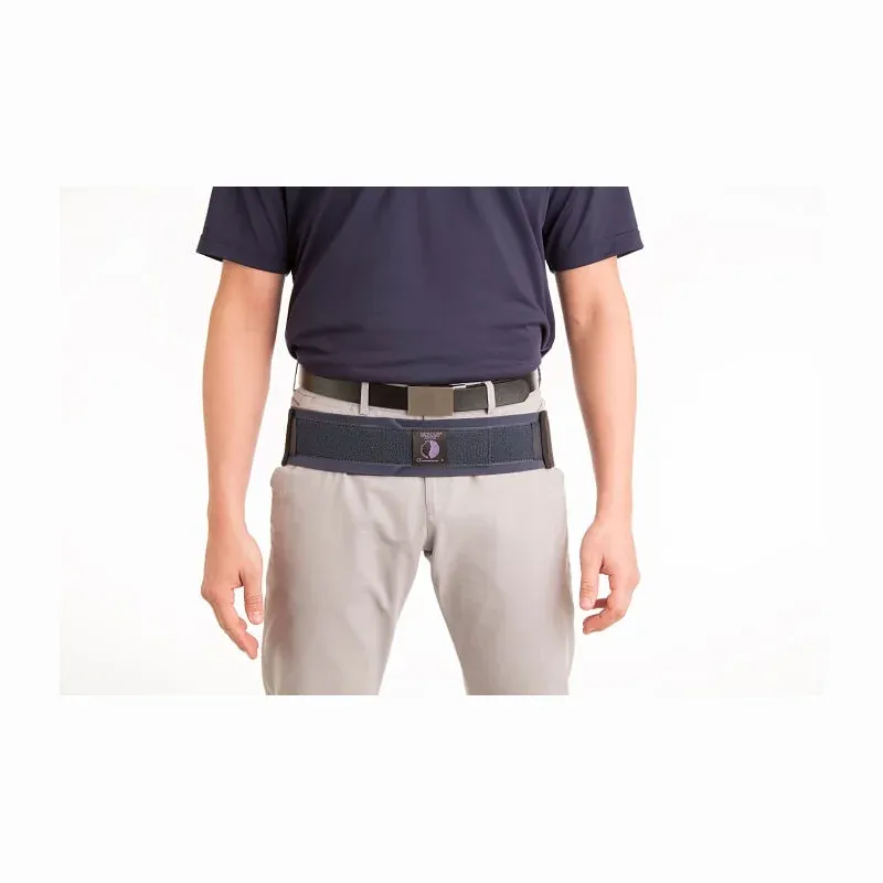 The belt worn over trousers, sitting just below the trouser belt at hip level