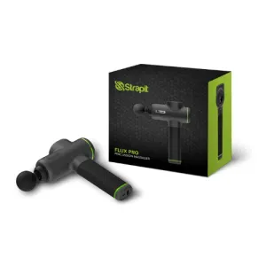 A dark grey Strapit Flux Pro massage gun with a round head fitted, beside its black and green retail box